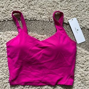 Crop Long line sports bra in hibiscus purple, size small, brand new, never worn